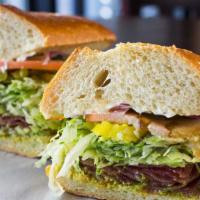 B to the L to the T · Bacon, lettuce, tomato, avocado, mayo, mustard, mojo (special garlic sauce, contains mayo) l...