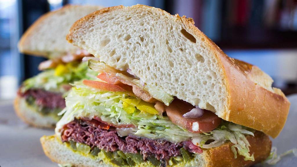 Heat · Roast beef, pastrami, pepperoni, pepper jack cheese, jalapeños, mayo, mustard, mojo (special garlic sauce, contains mayo) lettuce, tomatoes, pickles, onions, banana peppers, and pepperoncini.