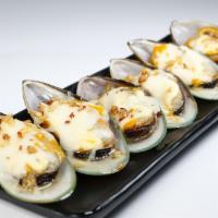 A11. Baked Mussels · Mozzarella cheese baked mussels with toasted garlic.
