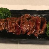 A17. Beef Steak Teriyaki · Grilled beef steak with teriyaki sauce.