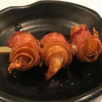 A25. Shrimp Wrapped with Bacon · Crispy fried shrimps wrapped with bacon.