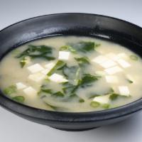 S01. Miso Soup · Soybean soup with tofu, seaweed, and scallion.