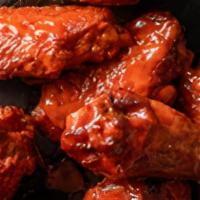 Classic Wings (12) · Six wing flavors from mild to wild! Our classic, bone-in wings are tossed in our flavorful s...