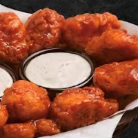 Boneless Wings (6 Pieces) · Enjoy our seasoned boneless wings tossed in your choice of sauce, or none at all, and served...