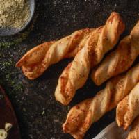 Garlic Parmesan Twists ™ (3) · Garlic parmesan twists are rolled fresh daily and baked to perfection with fresh garlic, our...