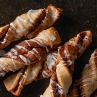 Cinnamon Twists · Rolled in a brown and white sugar cinnamon mixture and topped with a powdered sugar glaze. 1...