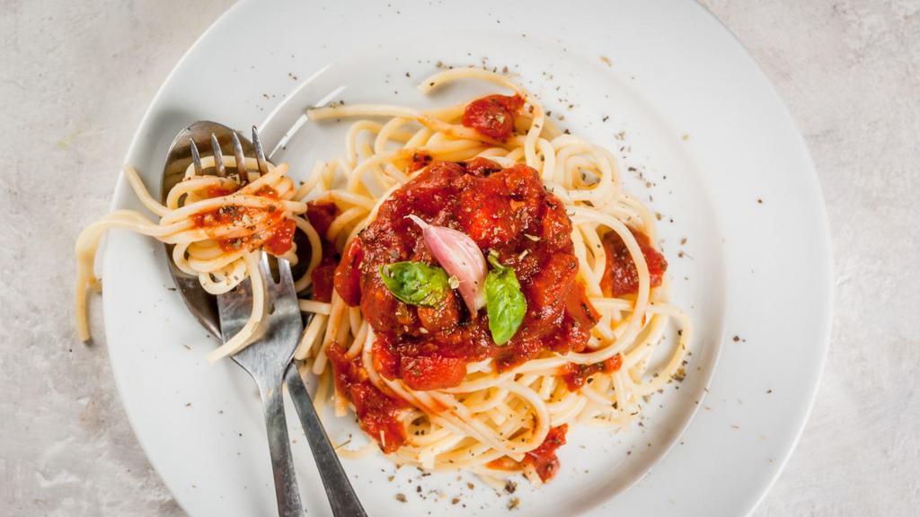 Spaghetti Marinara · Homemade spaghetti with the chefs special marinara sauce, garlic and basil.