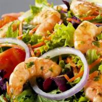 Shrimp Salad · Shrimp, lettuce, artichoke heart, and tomatoes with a side of house dressing.