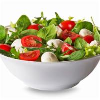 Spinach Salad · Spinach, feta, tomatoes, kalamata olives, and Italian dressing.