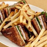 Club Sandwich · Turkey, Swiss cheese, bacon, lettuce and ttomato on toast.