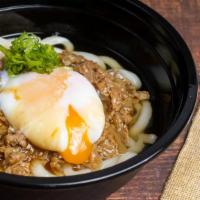Nikutama Udon 肉玉うどん · Udon, soup, dashi-tsuyu onion beef, ontama (soft-poached egg), scallion.