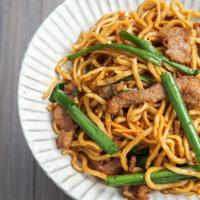 Stir Fried Noodles with Beef and Shrimp Paste  蝦膏牛肉炒粗面 · Cooked in oil.
