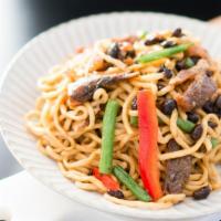 Stir Fried Noodles with Black Soybean Fish 豆豉鯪魚炒粗麵 · Noodle dish made from rice flour and water.