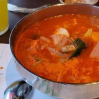 Army soup (Regular size) · Mild spicy. Kimchi hotpot with ramen, sausages and ham.