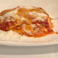 Lasagna Serafina · Lasagna in a beef ragu’ with fresh mozzarella