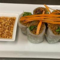 Shrimp Rolls · Deep fried shrimps mixed with thai spices wrapped with egg roll served with sweet and sour s...