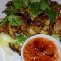 Bar-B-Que Chicken · Charcoal broiled chicken marinated in Thai spices.