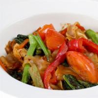 Pad Kee Mao (Drunken Noodles) · Your choice of meat sauteed thai basil, wide rice noodles, baby corn, onions, garlic and chi...