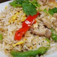 Spicy Basil Fried Rice · Choice of meat sauteed with cashew, thai basil, fried rice, baby corn, onions, tomatoes and ...