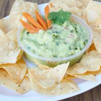 Guacamole and Chips · Serves 2-3 persons. Fresh handcrafted guacamole and house made chips.