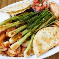 Fiesta Platter · Serves 2-4 persons. Nachos, garlic prawns, chicken flauta, corn quesadilla, grilled onions, ...