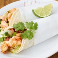 Grilled Salmon Taco · Grilled Salmon, lettuce and salsa.