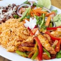 Tofu Mexicano  Dinner · Soy bean cake with rice, beans, salad and tortillas.