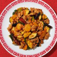Kung Pao Chicken · Spicy stir-fried chicken with vegetables, peanuts, and chili peppers.