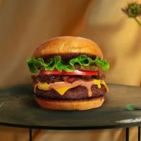 Build Your Own Vegan Burger · Seasoned 1/3 lb. Impossible meat patty topped with your favorite choice of toppings! Served ...