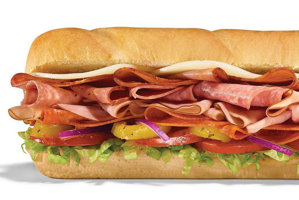 Supreme Meats Footlong Regular Sub · There’s good reason we named it Supreme: NEW Italian-style capicola, thin-sliced Black Forest Ham, Genoa Salami, and pepperoni on fresh-baked Artisan Italian bread topped with provolone, lettuce, tomatoes, red onions, and tangy banana peppers and drizzled with our famous MVP Parmesan Vinaigrette™. Do we need to say more?