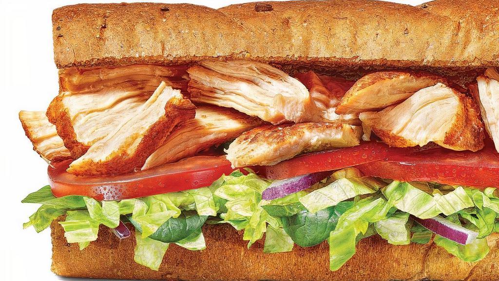 Rotisserie-Style Chicken Footlong Regular Sub · Who doesn’t love tender, juicy rotisserie-style chicken? Especially when it’s served on our Hearty Multigrain bread with your choice of veggies. We like lettuce, tomatoes, red onions, and peppers, but hey, it’s your sandwich, do what you like.