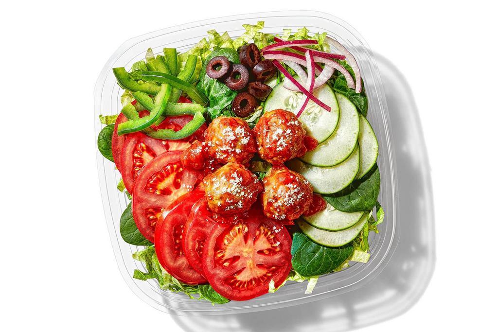 Meatball Marinara · The Meatball Marinara salad is the ultimate cravings crusher. Hot Italian-style meatballs in marinara sauce and a sprinkle of Parmesan cheese, all sitting on top of your favorite greens and veggies. Yes!