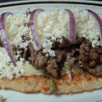 Huarache de Azado · Your choice of beef or chicken with nopales, Mexican (Monterey) cheese and onion
