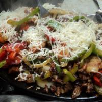 Alambre Combination Fajita · Grilled bell pepper, onion, bacon and chorizo, topped with cheese and a combination of beef,...