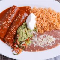 Mole Enchiladas (2) · Chicken or cheese enchiladas with a rich topping of mole.