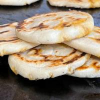 6 Queso Mini Pupusas  · Vegetarian, gluten-free. Griddled corn cake stuffed with Monterey-jack cheese. Served with a...