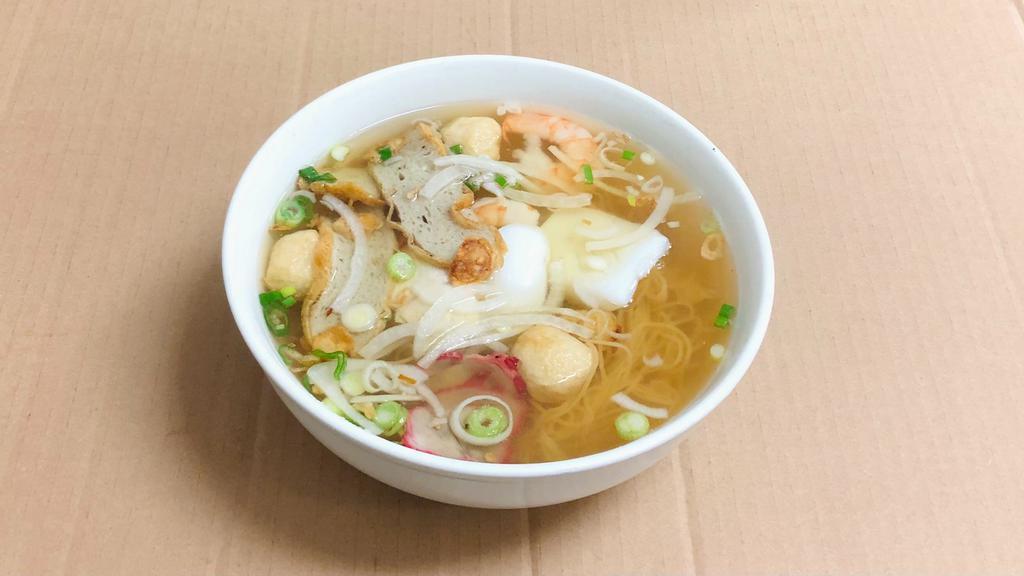 26. Special Combo Egg Noodle Soup/ Mì · With shrimp, squid, chicken. Fish ball pork & fish cake slices with egg noodle soup.