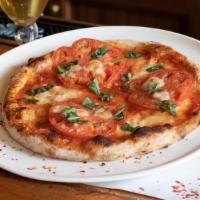 Traditional Italian Margherita Pizza · Housemade Organic Tomato Sauce / Basil  Fresh Mozzarella. (Add Tomato for an Additional Char...