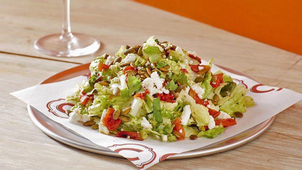 C Chop Salad · Romaine and green leaf lettuces, queso fresco, green onions, red bell peppers, cilantro and  chile spiced pumpkin seeds and finished with fleur de sel.  Served with a creamy lime-cilantro dressing.
Vegetarian.