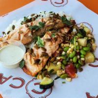 Grilled Atlantic Salmon Plate · Our traditional Atlantic Salmon plate only better!  Simply grilled and served atop a grilled...