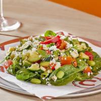 Vegan Power Green, Grilled Corn, Red Pepper and Edamame Salad · Power greens tossed in a lemon vinaigrette with grilled corn salsa, zucchini, red bell peppe...