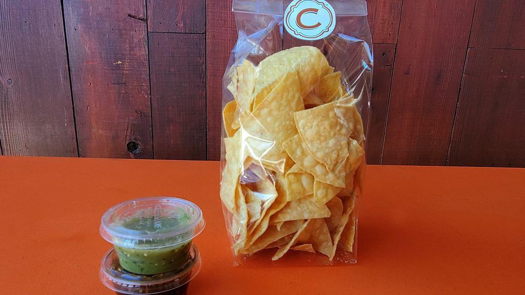 Housemade Chips & Salsas · House-made daily with yellow corn tortillas, expeller pressed, non-GMO canola oil and sea salt.