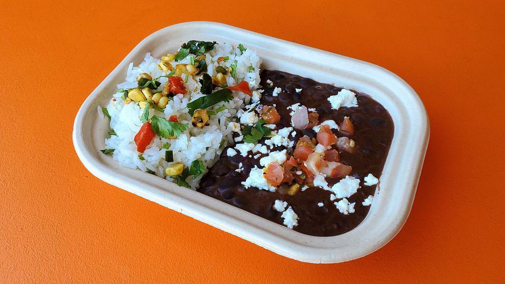 Cilantro Cumin Rice & Beans · Jasmine rice, cumin, cilantro and garnished with grilled corn salsa and fresh lime:  offered with our C CASA Black Beans (w/ chorizo & artisan goat cheese), Whole Black Beans or White Beans.