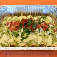 Cheese Enchilada Tray · Six enchiladas, crafted with our handmade, non-GMO, organic white corn tortillas, Oaxacan an...