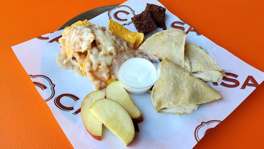 Kid's Cheese Quesadilla Plate · Oaxacan cheese inside our housemade, non-GMO white corn tortillas.  Served with C CASA tortilla chips topped with white beans, lime crema, Fuji apple slices, Mexican chocolate brownie bites and housemade lemonade.