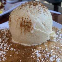 Tres Leche pancakes · Short stack with caramel syrup, Topped with Vanilla Ice cream, Milkmaid and Cinnamon