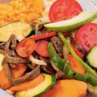 FAJITAS · Grilled steak or chicken with onions and bell peppers; grilled shrimp availbale instead for ...