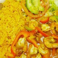 CAMARONES AL MOJO DE AJO · Shrimp in garlic sauce. Served with Spanish rice, refried beans, a side salad, and handmade ...