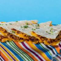 Al Pastor Quesadilla · Al pastor and shredded melted cheese in a crispy flour tortilla and served with a side of pi...