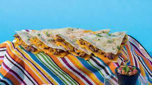 Steak Quesadilla · Steak and shredded melted cheese in a crispy flour tortilla and served with a side of pico de gallo and sour cream.